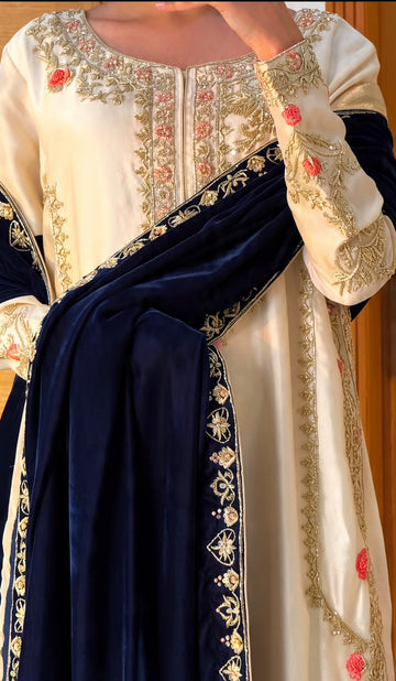 How to Style Ivory Royale: A Lava Silk Suit with Velvet Shawl for Winter Weddings