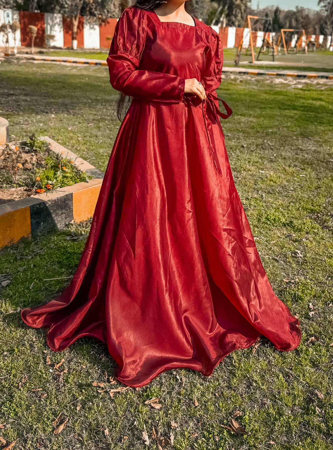 Elegant Red Maxi Long Frock Gown designed for girls — featuring delicate embroidery and a flowing silhouette perfect for weddings or parties.