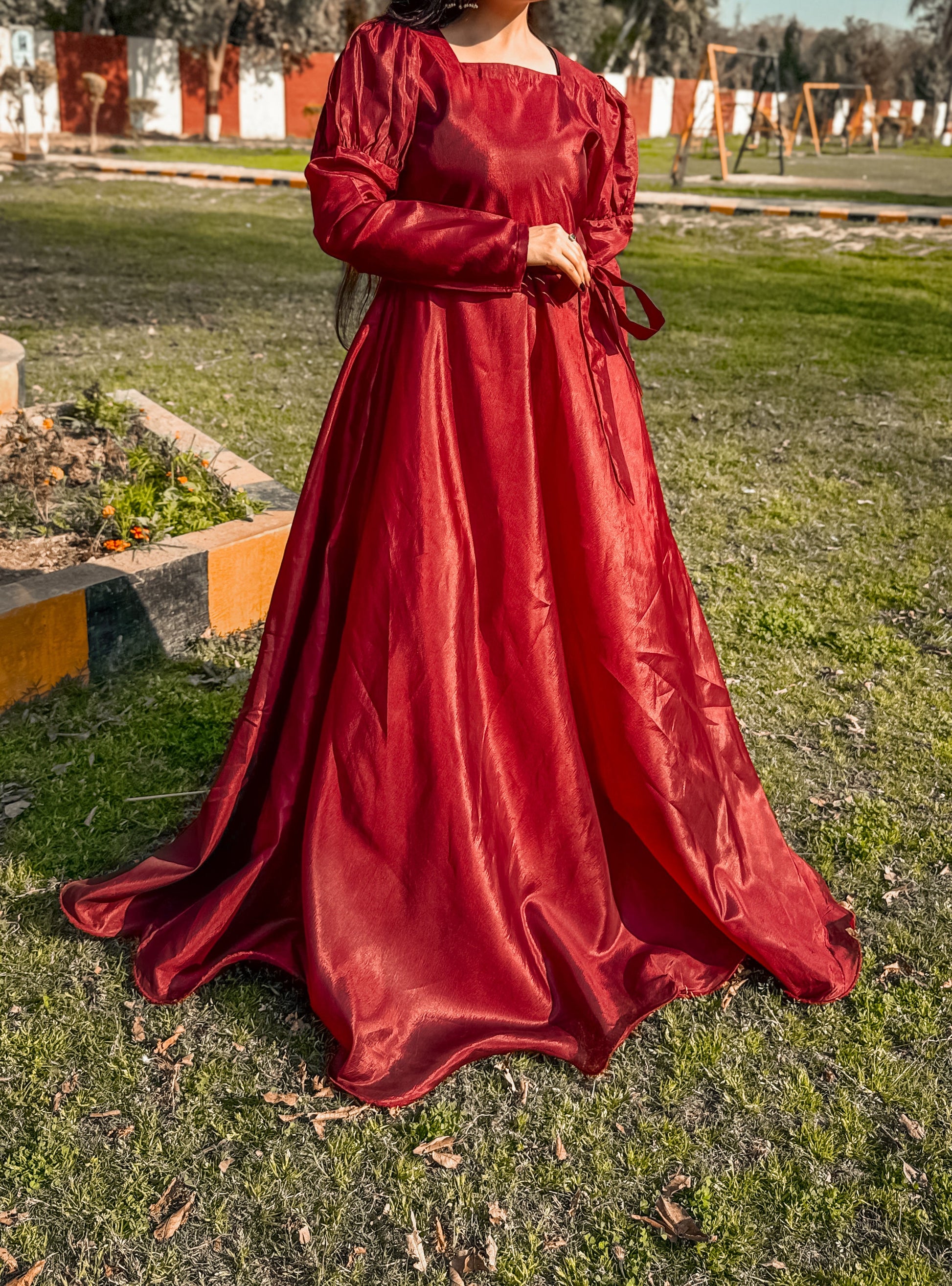 Elegant Red Maxi Long Frock Gown designed for girls — featuring delicate embroidery and a flowing silhouette perfect for weddings or parties.